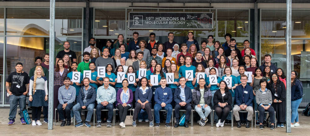 group photo from Horizon 2023 with organizing team holding up letters that spell 'see you in 2023'